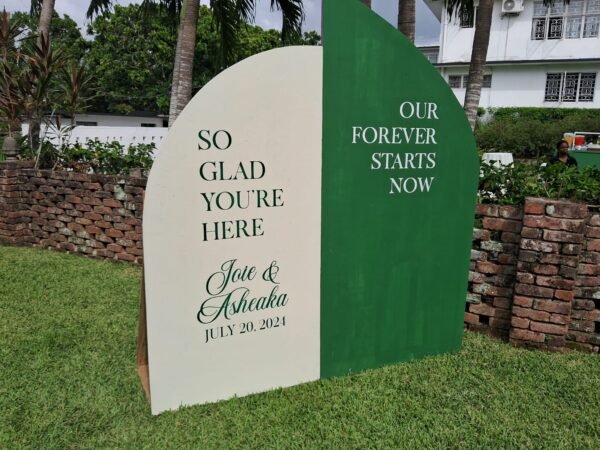 wedding decor rentals in jamaica - elegant tables, chairs backdrop and welcome sign